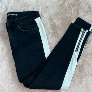 Black jeans with white stripe